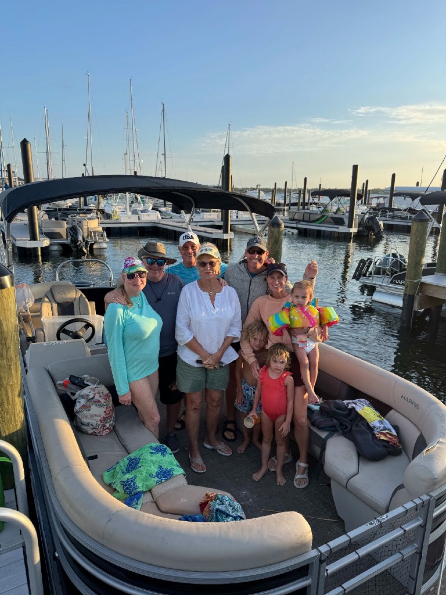 Family and friends on the pontoon at the marina